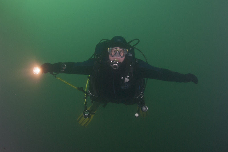 Diver with torch