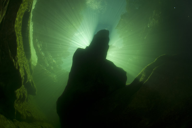 Rock pillar with sun beams