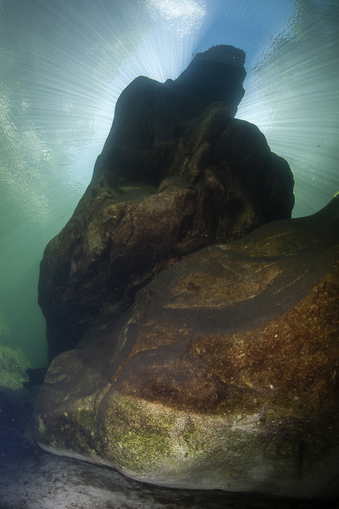 Rock pillar with sun beams