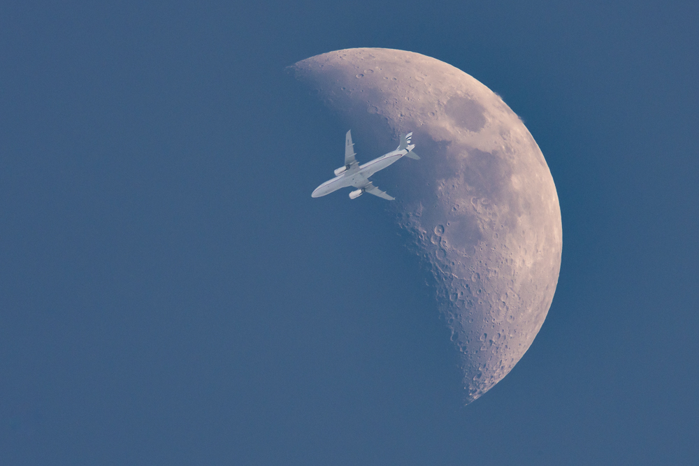 Aircraft in Front of the Moon