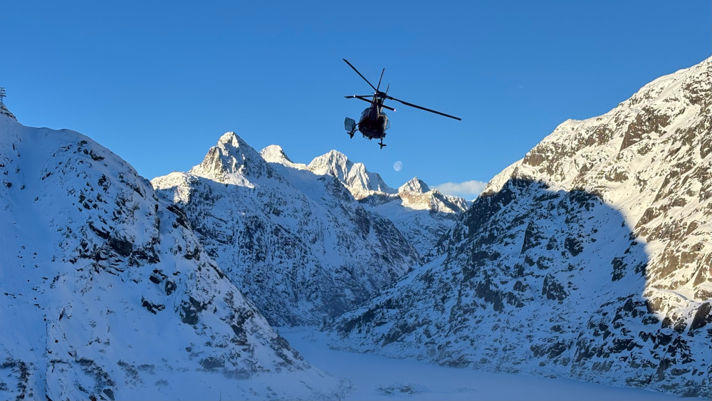 Lake Grimsel with helicopter and Moon
