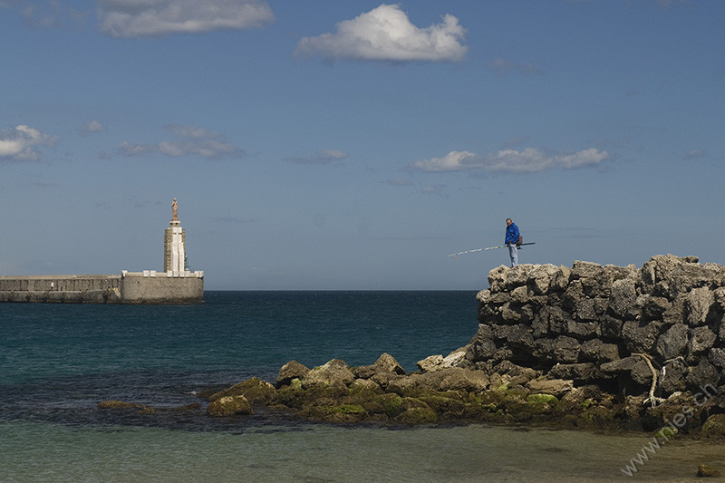 Santo and fishermen