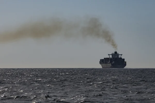 Cargo ship with smoke