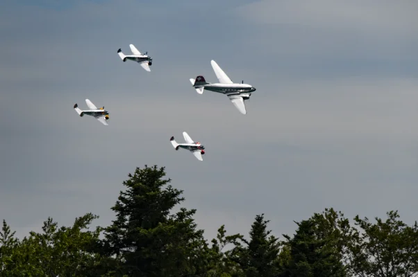 Classic Formation. Swissair Douglas DC-3 and three Beechcraft Model 18 Twin Beech.