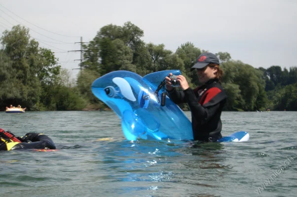 Fotografin auf Delfin