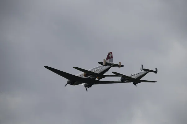 Classic Formation. Swissair Douglas DC-3 and three Beechcraft Model 18 Twin Beech.