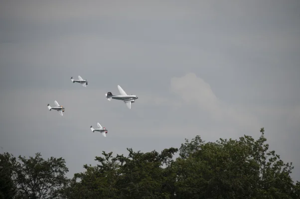 Classic Formation. Swissair Douglas DC-3 and three Beechcraft Model 18 Twin Beech.