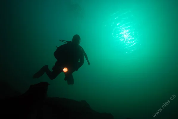 Diver with torch